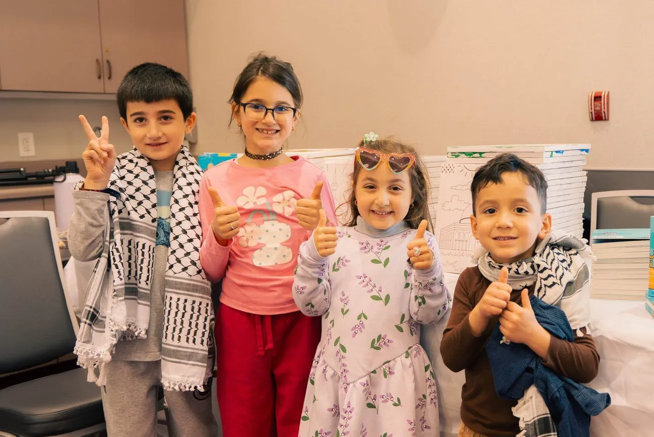 Smiling children at one of our community events